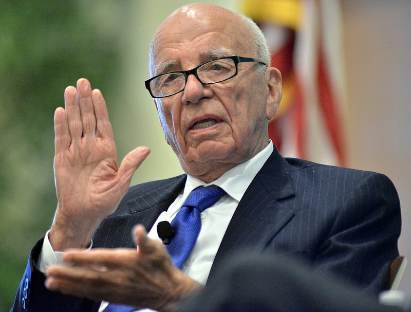 
              FILE - In this Aug. 14, 2012 file photo, Rupert Murdoch speaks during a forum on The Economics and Politics of Immigration, in Boston. Murdoch, 84, is preparing to hand over the CEO job at Twenty-First Century Fox Inc. to his son, James, according to multiple media reports Thursday, June 11, 2015. (AP Photo/Josh Reynolds, File)
            