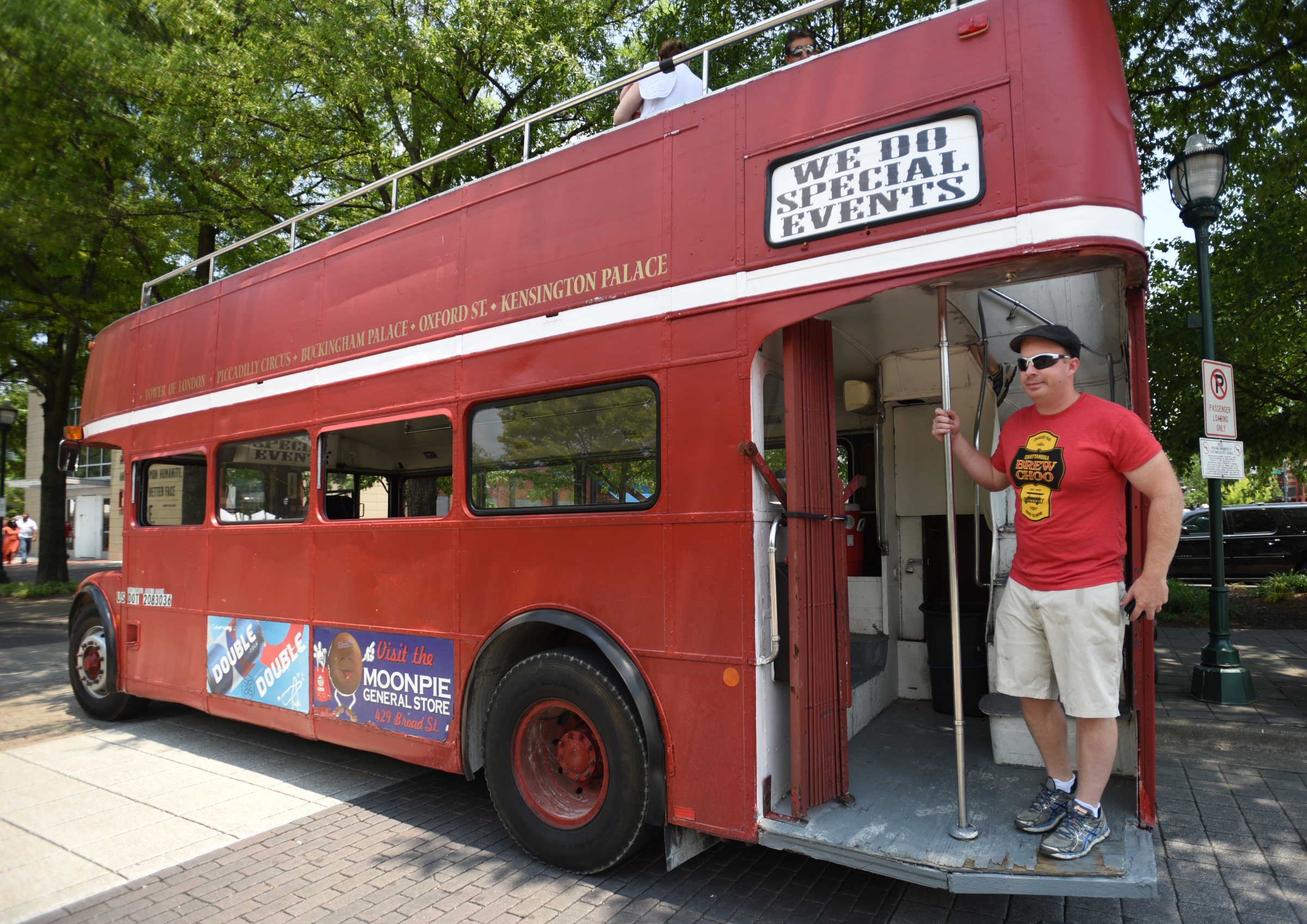 Rufus Marye stands with the double-decker bus before beginning a tour downtown. The bus has a cameo in the movie "Captain America: Civil War," which is due out in May 2016.