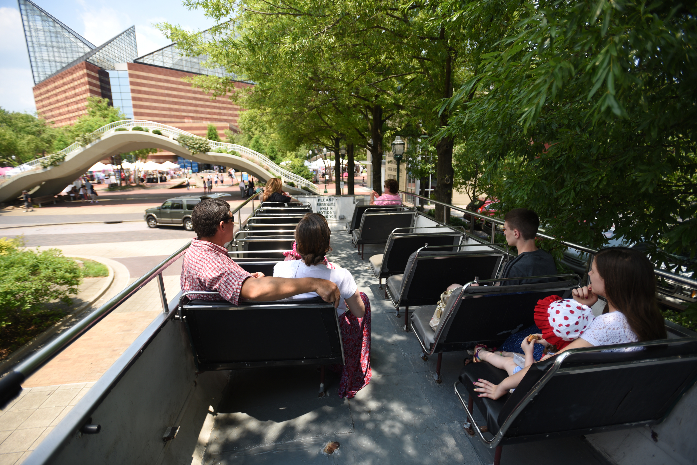 Passengers sit atop the double-decker bus before beginning a tour Saturday afternoon. The bus has a cameo in the new Captain America movie that is being made now.