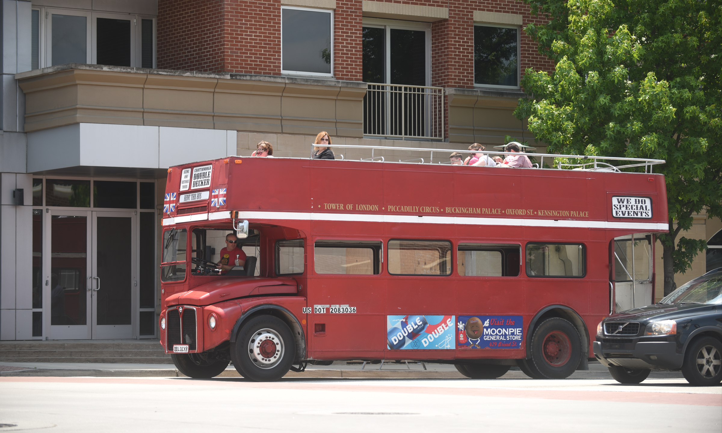The double-decker bus travels down Frazier Avenue during a tour Saturday afternoon. The bus has a cameo in the new Captain America movie that is being made now.
