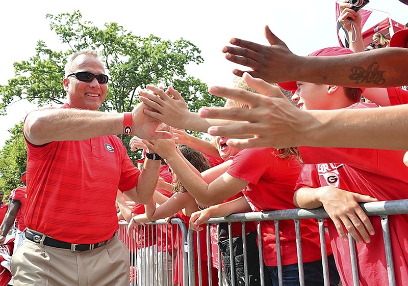 Georgia football coach Mark Richt greets fans prior to last season's game against Clemson. Richt and new offensive coordinator Brian Schottenheimer landed a big recruit for their 2017 signing class Friday when McEachern High School quarterback Bailey Hockman committed to the Bulldogs. University of Georgia Photo.