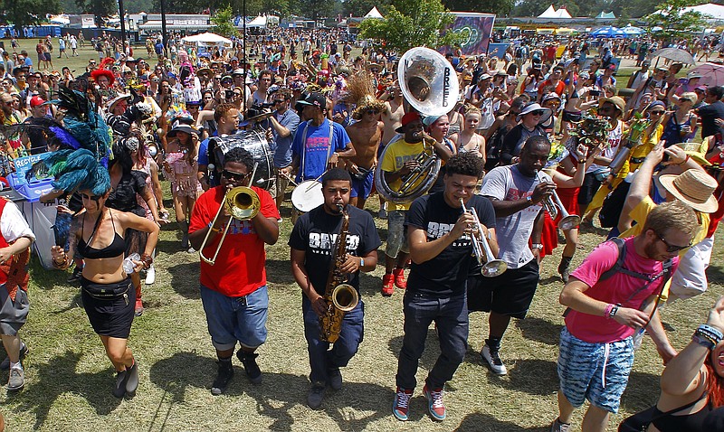 New Breed Brass Band performs at the Bonnaroo Music and Arts Festival on Friday, June 12, 2015 in Manchester, Tenn. (Photo by Wade Payne/Invision/AP).