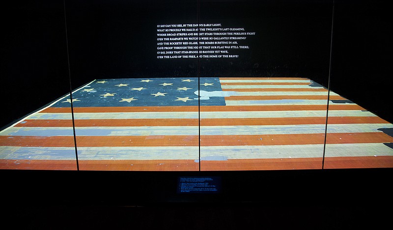 This September 2014 photo shows the Smithsonian's National Museum of American History in Washington exhibit of the flag that inspired the national anthem "Star-Spangled Banner."