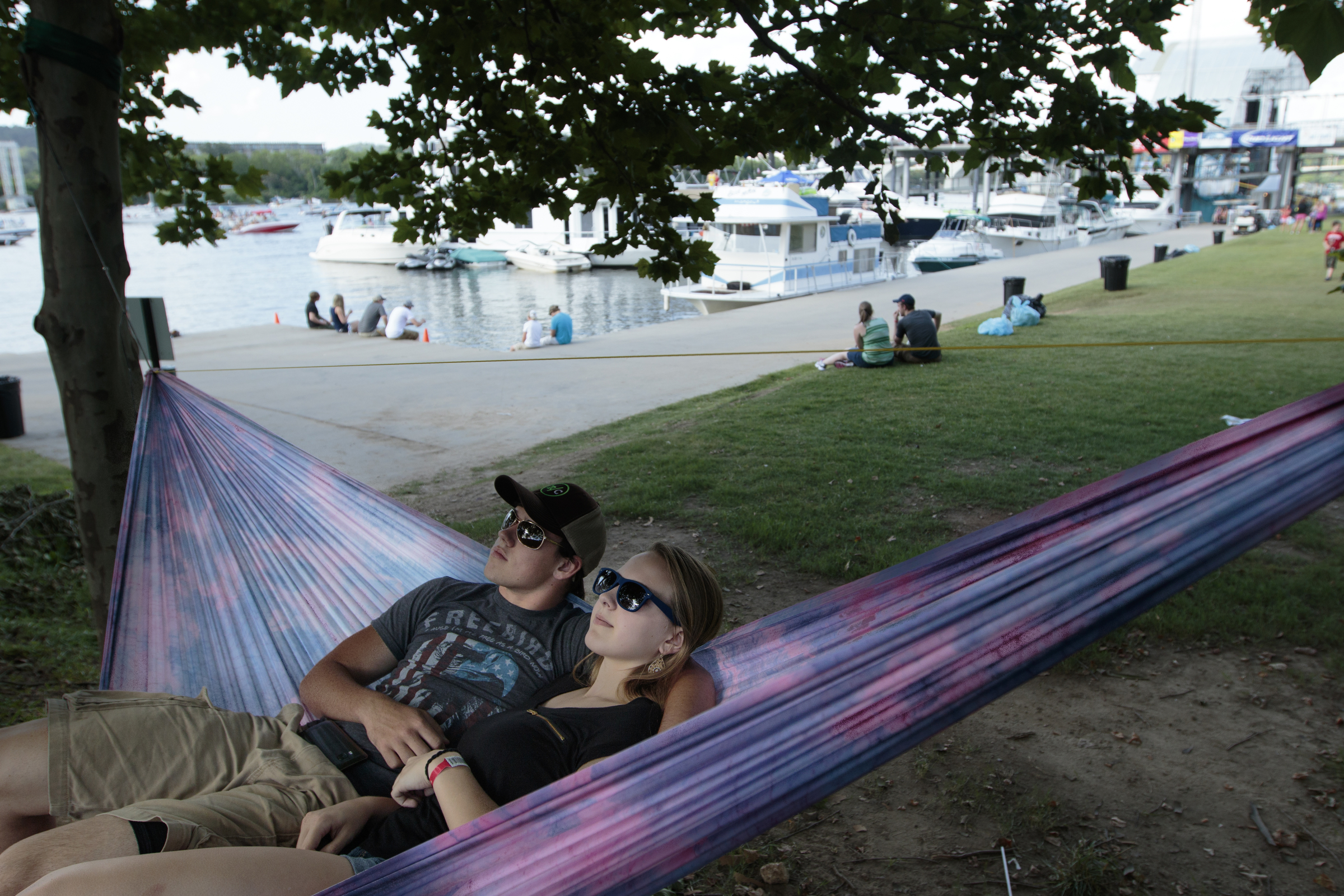 Staff photo by Doug Strickland
Bailey Palmer, right, and Dylan Graham relax in a hammock near the Tennessee River during the final day of the Riverbend Festival on Saturday, June 13, 2015, in Chattanooga, Tenn. Headliner Stone Temple Pilots closed the festival.
