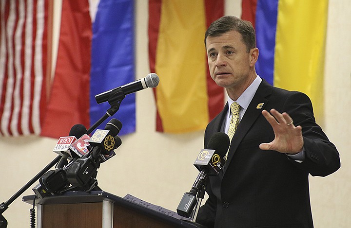 Staff Photo by Dan Henry / The Chattanooga Times Free Press- 4/13/15. UTC's David Blackburn announces Matt McCall as the University of Tennessee at Chattanooga's new head men's basketball coach while at the UTC University Center on Monday, April 14, 2015. McCall was an assistant coach at the University of Florida and is the 19th head coach in the history of Chattanooga basketball. 