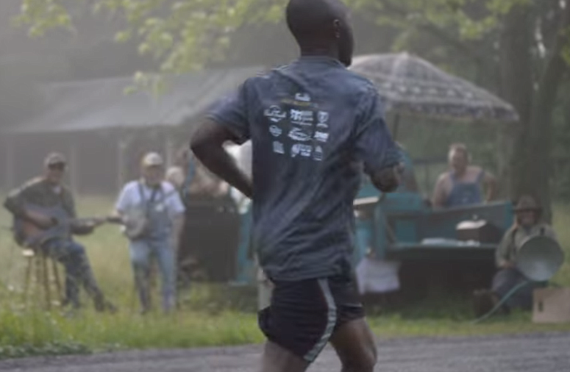 For marathon runners jogging through Leiper's Fork, a group of hecklers dressed up in overalls, making pig sounds and playing dueling banjos may have come as a surprise. 