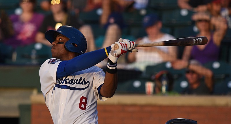 Lookouts left fielder Adam Brett Walker II hits during a game against Jacksonville Suns at AT&T Field.