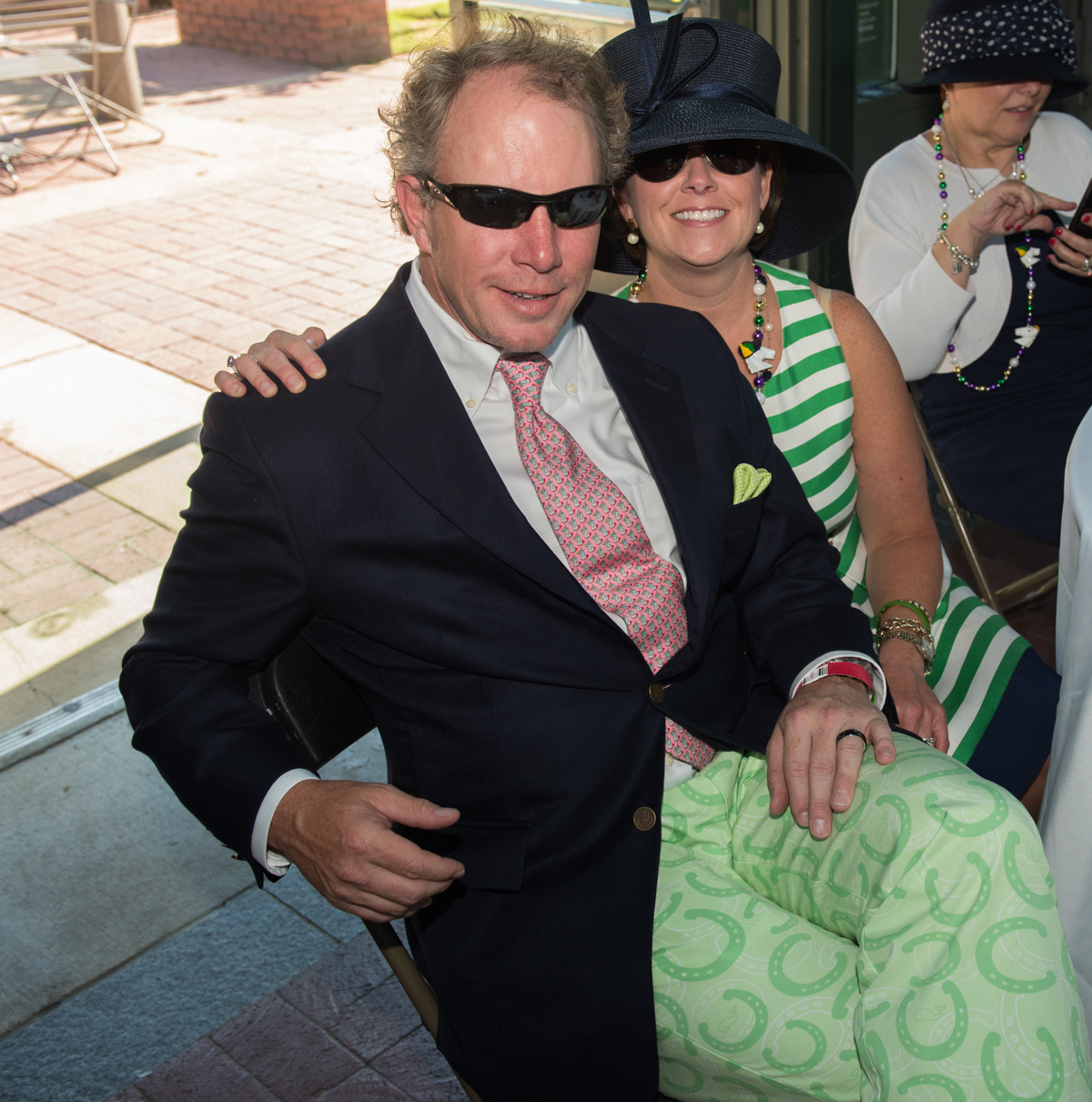 Eddie and Kathy O'Brien. The horseshoe print of his pants fit the Derby theme.