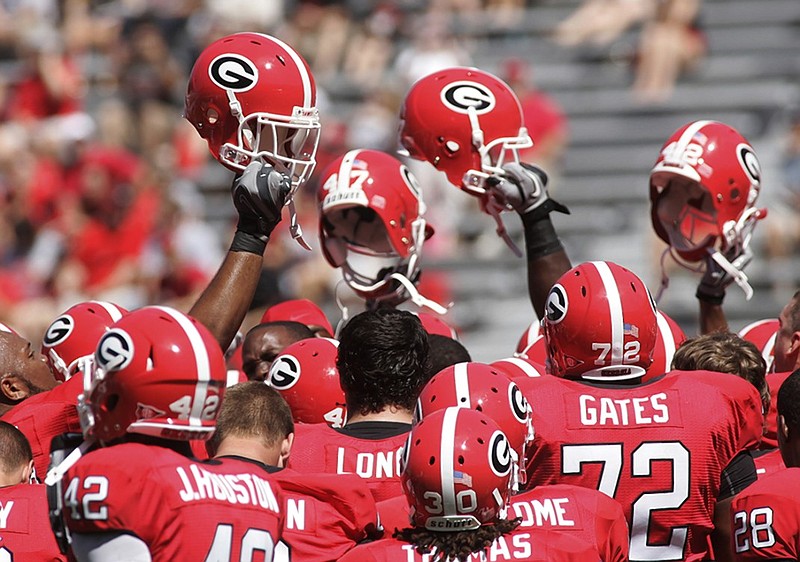 The University of Georgia's football team will not have offensive lineman DeVondre Seymour, the adopted son of former Bulldogs standout defensive lineman Richard Seymour, on its roster this fall. The younger Seymour, who originally signed with Georgia in 2013 and spent the past two years at Hinds (Miss.) Community College, has decided to end his playing career. Photo by The Associated Press.