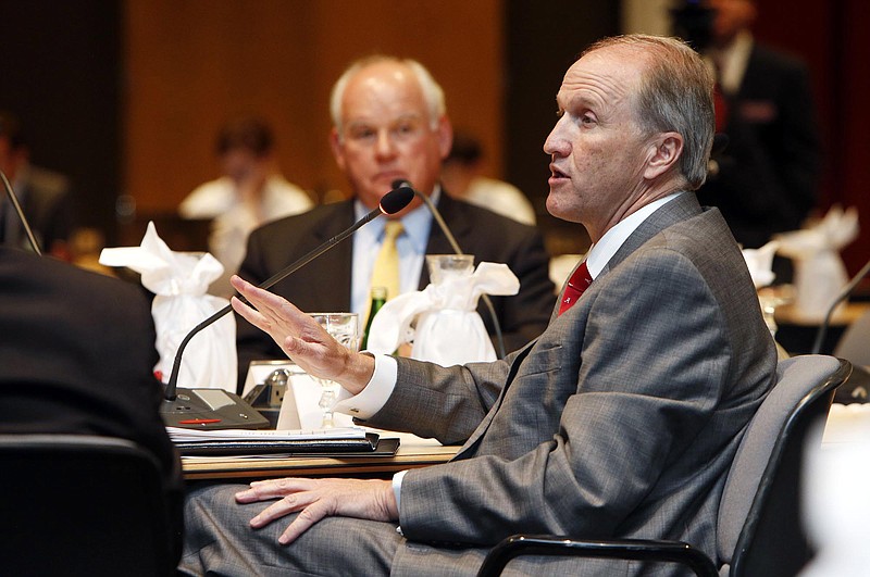 Stuart Bell answers questions from board members during a specially called meeting of the University of Alabama board of trustees at the Bryant Conference Center Thursday, June 18, 2015. 