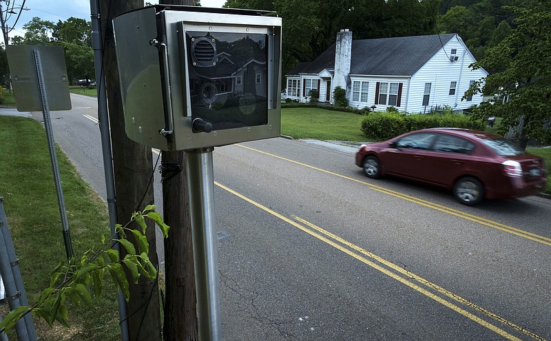 Staff photo by Doug Strickland
A vehicle passes a traffic camera on Germantown Road on Friday, June 19, 2015, in Chattanooga, Tenn.