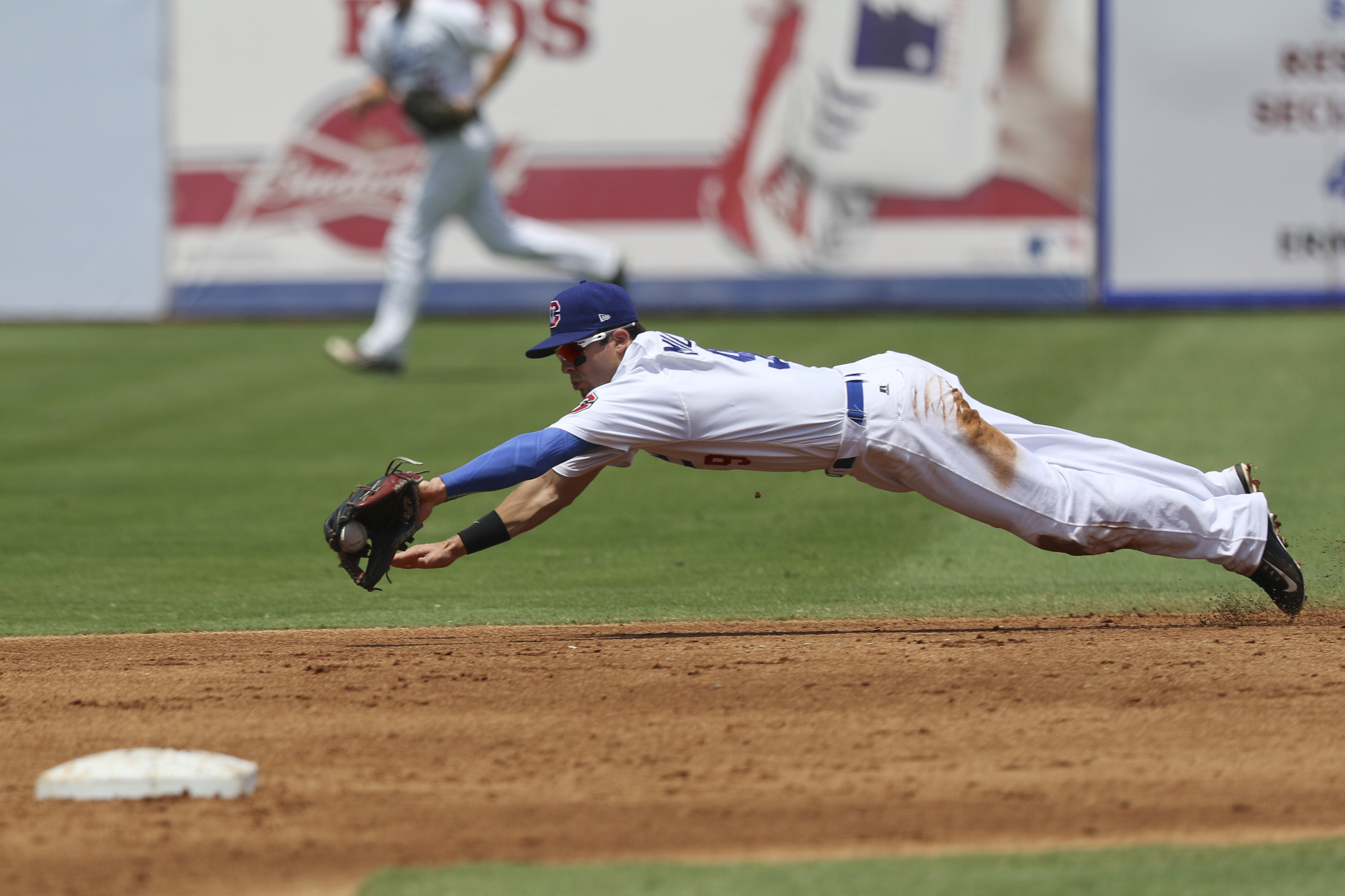 Staff Photo by Dan Henry / The Chattanooga Times Free Press- 6/21/15. Chattanooga Lookouts second baseman Levi Michael (9) dives to make a catch before throwing to first for an out while playing the Jacksonville Suns at AT&T field on Sunday, June 21, 2015.