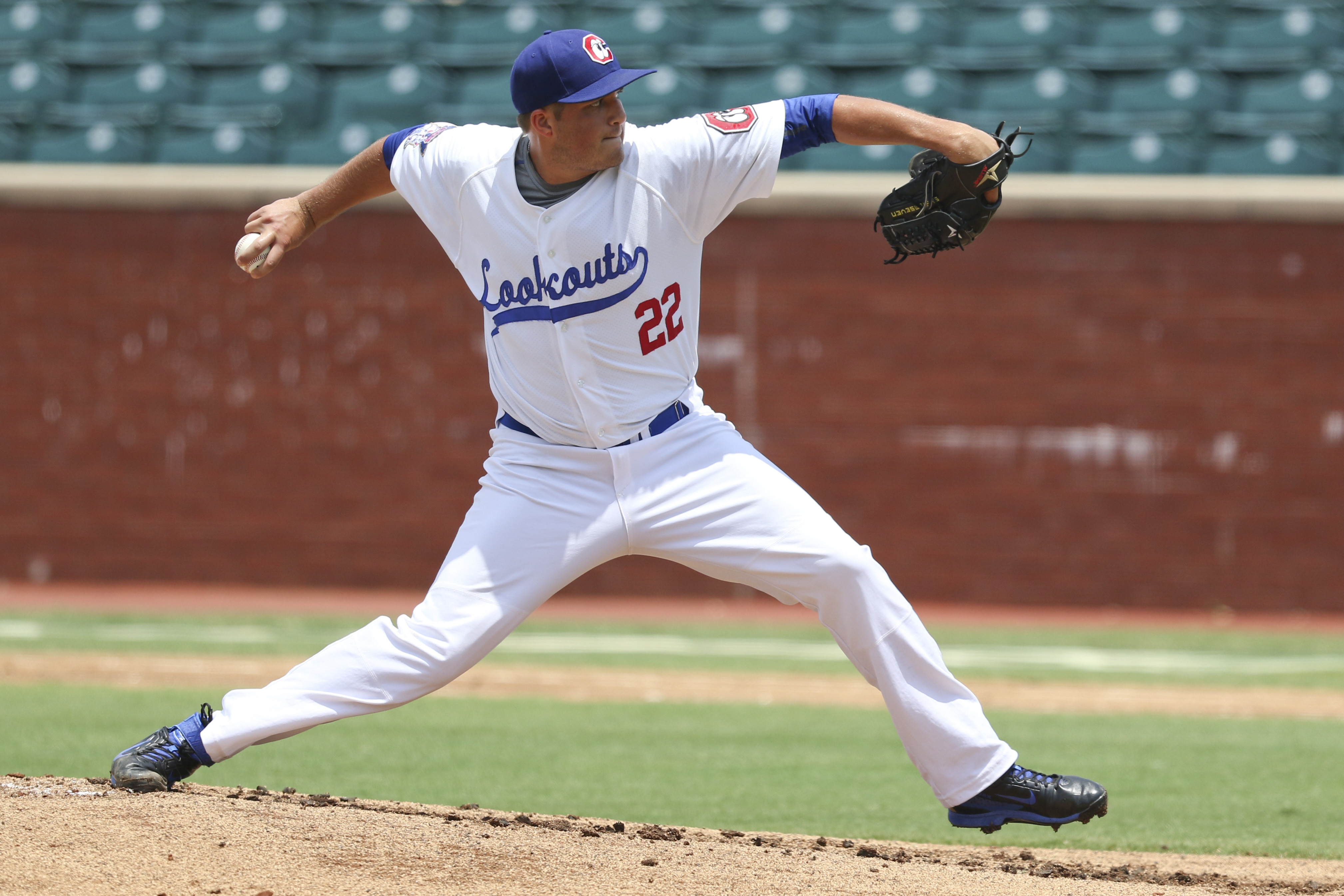 Staff Photo by Dan Henry / The Chattanooga Times Free Press- 6/21/15. Chattanooga Lookouts DJ Baxendale (22) pitches while playing the Jacksonville Suns at AT&T field on Sunday, June 21, 2015.