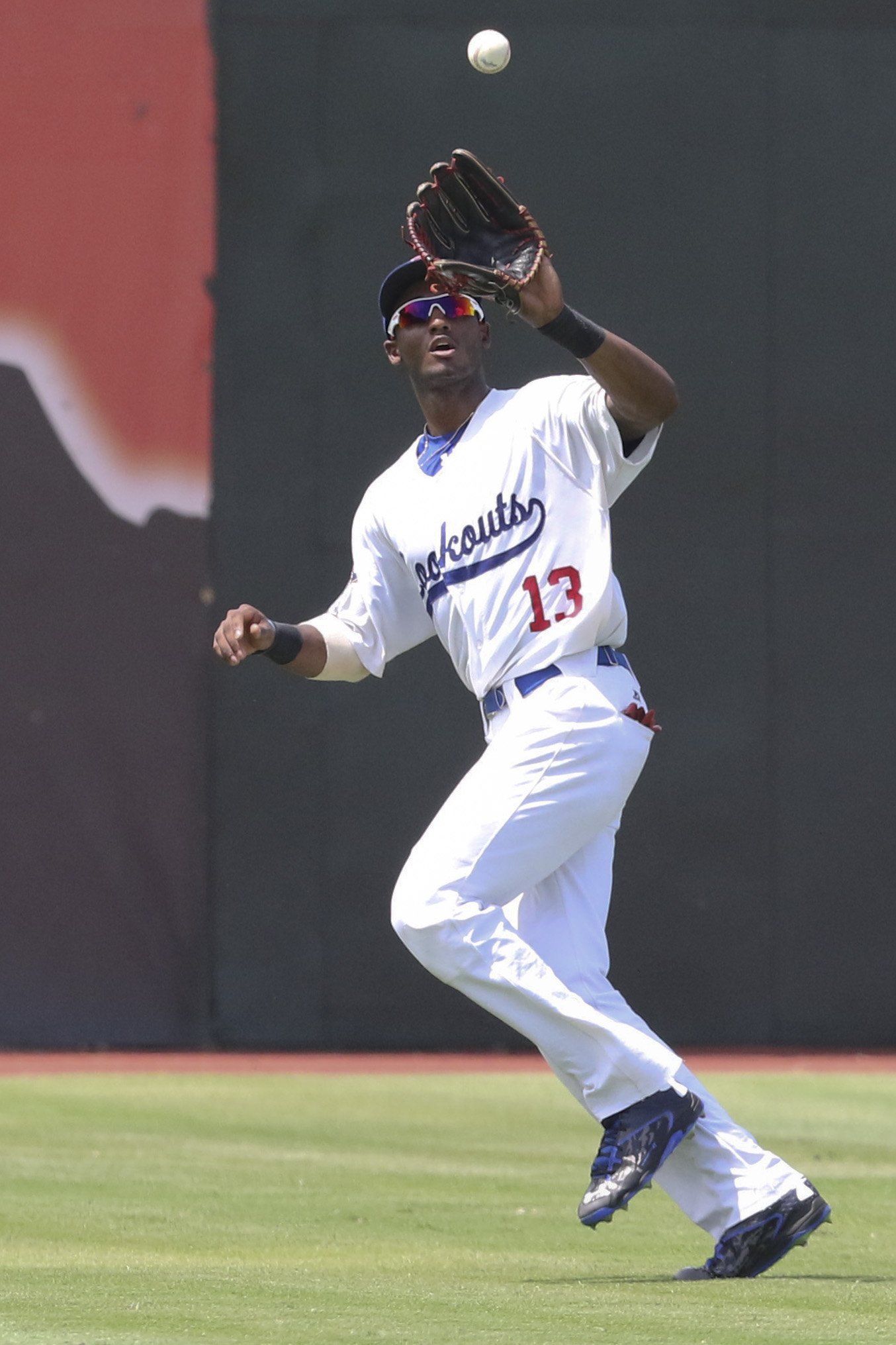 Staff Photo by Dan Henry / The Chattanooga Times Free Press- 6/21/15. Chattanooga Lookouts outfielder Niko Goodrum (13) makes a catch while playing the Jacksonville Suns at AT&T field on Sunday, June 21, 2015.