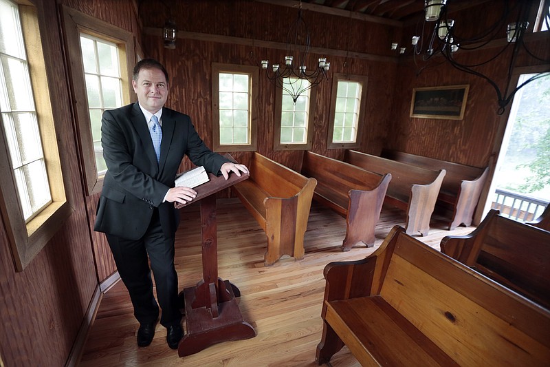 
              In this June 19, 2015, photo, Pastor Greg Bullard is shown in his chapel in Madison, Tenn. Bullard intends to perform same-sex weddings in the chapel if the U.S. Supreme Court lifts the state's gay marriage ban. (AP Photo/Mark Humphrey)
            