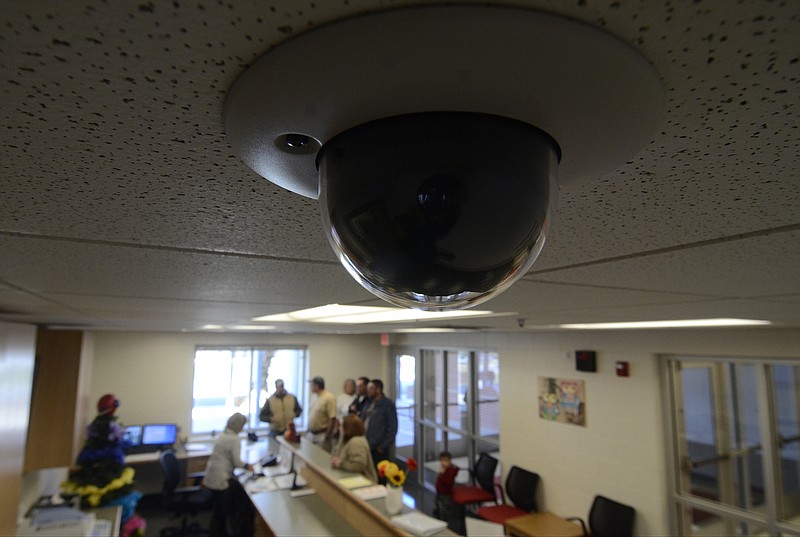 A ceiling-mounted camera is part of a security system purchased for Ooltewah Elementary School.