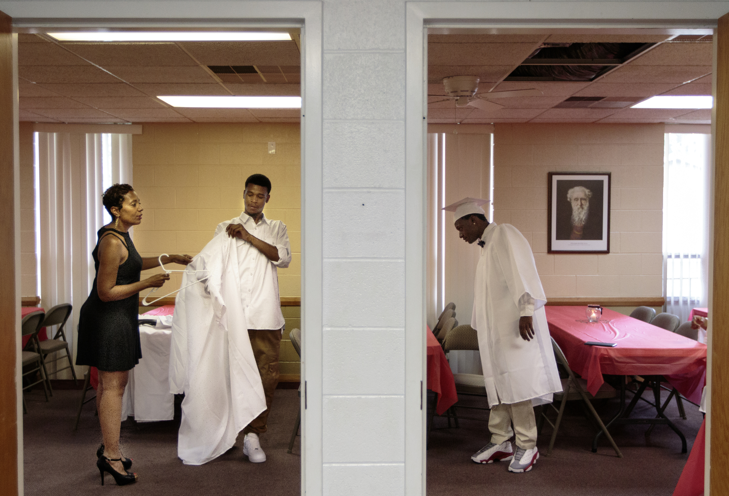 Staff photo by Doug Strickland
Dr. Selina Thedford, left, talks with Markious Sims, center, and DePriest Deloney before Brainerd High School's first-ever summer graduation Tuesday, June 23, 2015, at the North Moore Road Salvation Army, across from the high school, in Chattanooga, Tenn.