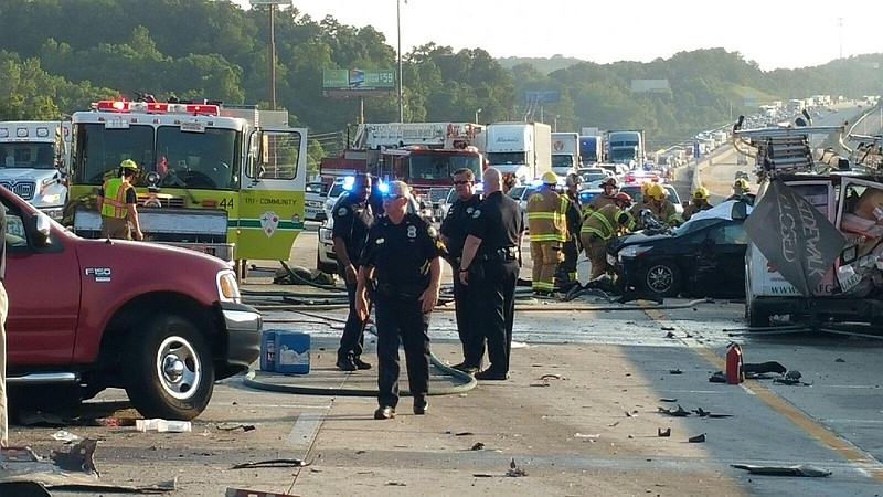 Emergency crews work the scene of a multiple-vehicle accident on I-75 in this Chattanooga Police Department photo.