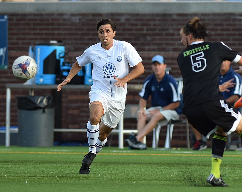 Staff photo by Robin Rudd
Chattanooga's Luis Trude (8) breaks to the ball past Knoxville's Alex Whaddell (5).  The Knoxville Force visited the Chattanooga FC at Finley Stadium Saturday June 27, 2015.