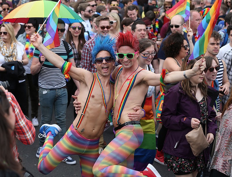 
              Participants on O'Connell Street in Dublin take part in a Gay Pride parade in Dublin Saturday June 27, 2015.  (Niall Carson/PA via AP) UNITED KINGDOM OUT  
            