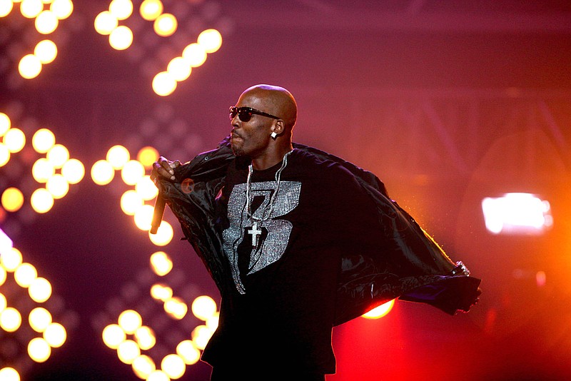 
              FILE- In this Oct. 1, 2011 file photo, DMX performs during the BET Hip Hop Awards in Atlanta. The rapper was arrested outside Radio City Music Hall by the New York City Sheriff’s Department on Friday, June 26, 2015, for failure to pay back child support, a spokesman for the NYC Sheriff's Department tells WPIX-TV. (AP Photo/David Goldman, File)
            