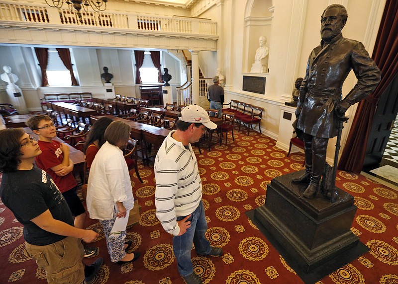 Following the slaying of nine people by a young white supremacist in Charleston, S.C,, calls for the removal of statues of Confederate generals, similar to this one of Robert E. Lee in the Old House chambers in the Virginia capitol building in Richmond, have proliferated.