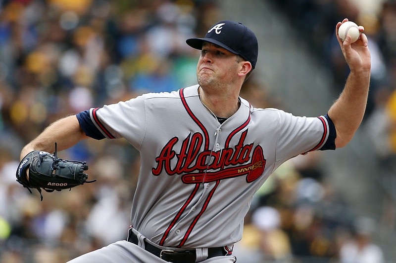 Atlanta Braves starting pitcher Alex Wood delivers in his game against the Pittsburgh Pirates in Pittsburgh, Sunday, June 28, 2015.