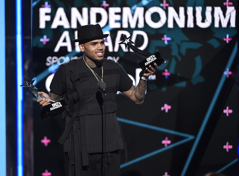 Chris Brown accepts the fandemonium award at the BET Awards at the Microsoft Theater on Sunday, June 28, 2015, in Los Angeles.