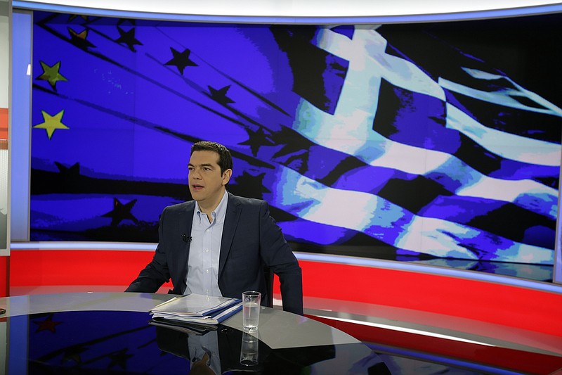 Greece's Prime Minister Alexis Tsipras prepares for a TV interview at the State Television in Athens on Monday, June 29, 2015.
