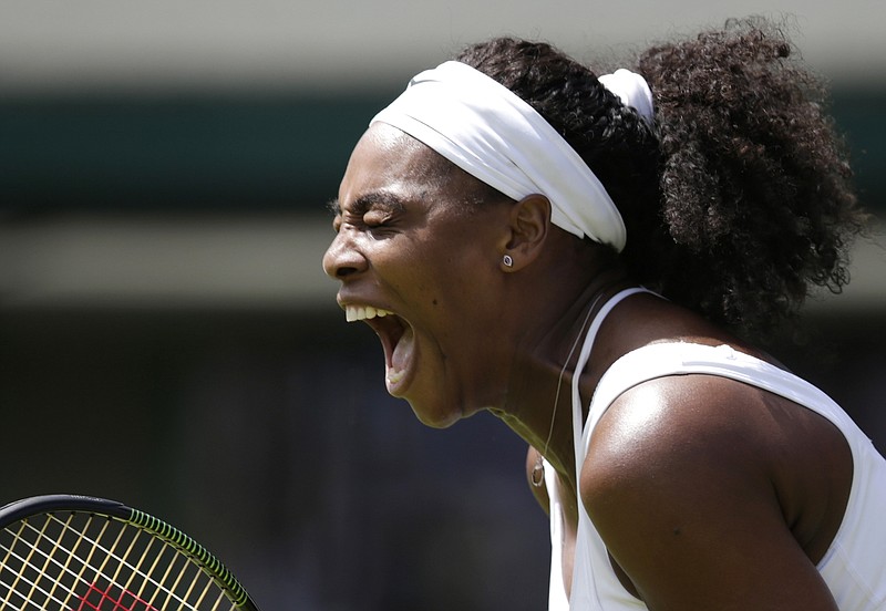Serena Williams of the United States celebrates a point during the women's singles first round match against Margarita Gasparyan of Russia at the All England Lawn Tennis Championships in Wimbledon, London, on Monday June 29, 2015.