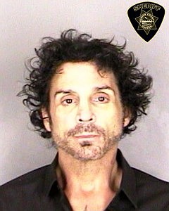 
              FILE - This Sunday, June 14, 2015 file booking photo provided by the Marion County Sheriff's office taken shows Deen Castronovo, drummer for rock band Journey, in Salem, Ore. Castronovo sat in jail Tuesday, June 30, 2015, after being indicted on a rape charge two weeks after his domestic violence arrest. (Marion County Sheriff's Office via AP, File)
            