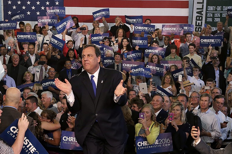 New Jersey Gov. Chris Christie takes the podium before speaking to supporters during an event announcing he will seek the Republican nomination for president, Tuesday, June 30, 2015, at Livingston High School in Livingston, N.J.