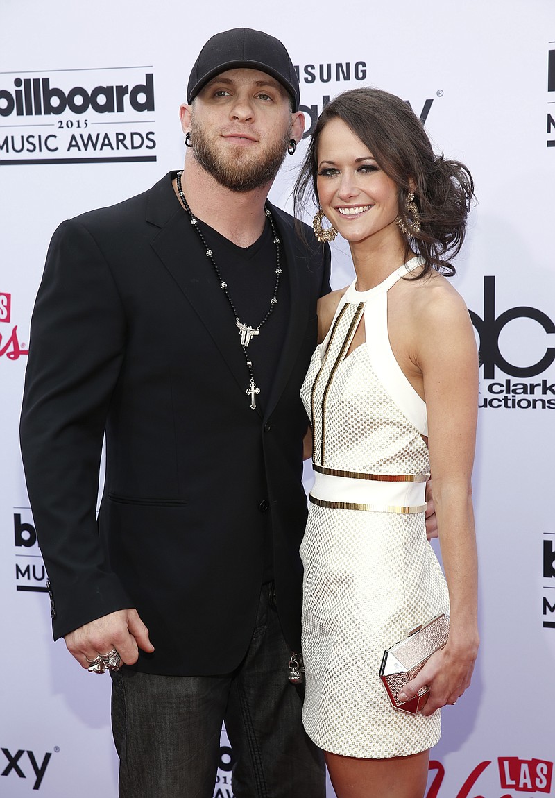 
              FILE - In this May 17, 2015 file photo, Brantley Gilbert, left, and Amber Cochran arrive at the Billboard Music Awards in Las Vegas. A representative for Gilbert said Wednesday, July 1, that the couple wed on Sunday, June 28. The couple announced their engagement last October. (Photo by Eric Jamison/Invision/AP, File)
            