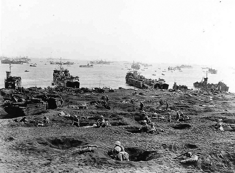Photo Contributed by Paul GeorgeSoldiers dig foxholes in the beach at Iwo Jima.