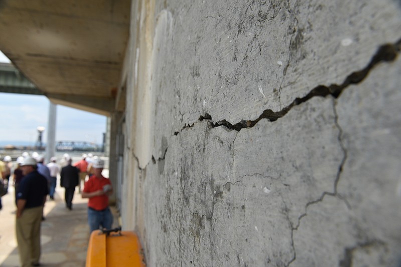 Staff Photo By John RawlstonCracks in the Chickamauga Dam walls like the one pictured are one reason Tennessee elected leaders are excited to hear $3 million has been released for work on the new lock project.