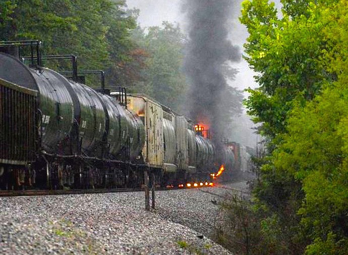 A car on a CSX train carrying a flammable and toxic substance derailed and caught fire in eastern Tennessee, prompting the evacuation of thousands within a 2-mile radius.
