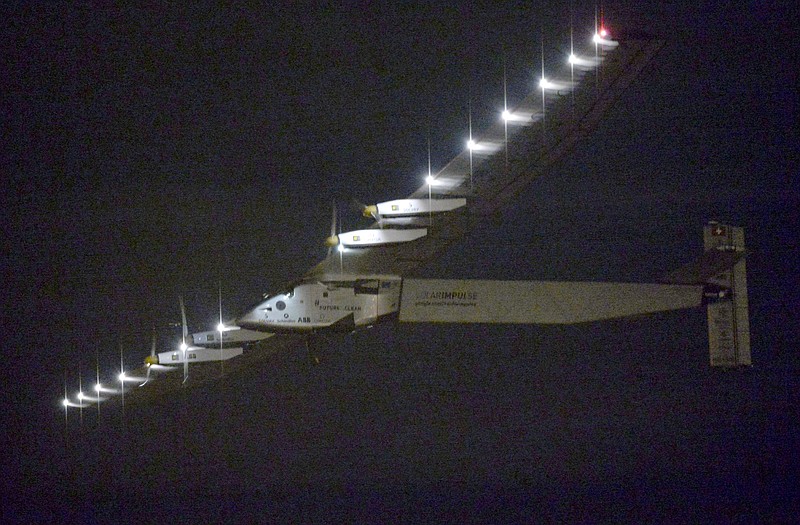 
              FILE - In this Monday, June 29, 2015, file photo, the Solar Impulse 2 flies over Nagoya Airport after taking off in Toyoyama, near Nagoya, central Japan. The solar-powered plane, journeying around the world without fuel, depending on the weather is expected to land in Hawaii early Friday morning, July 3, 2105.(Kyodo News via AP, File) JAPAN OUT, MANDATORY CREDIT
            