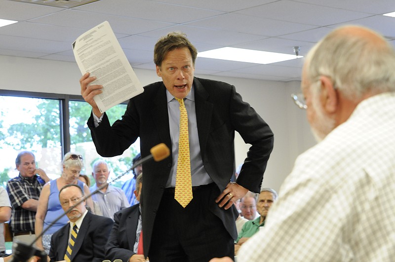 Attorney Stuart James questions an official in this  May 14, 2013, file photo.