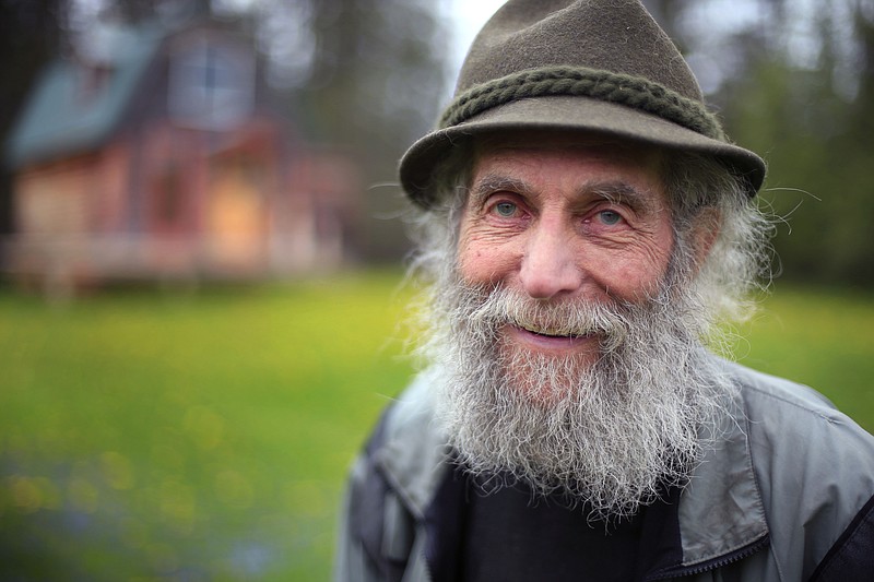 Burt Shavitz poses for a photo on his property in Parkman, Maine, in May 23, 2014, file photo. Shavitz, a former beekeeper, is the Burt behind Burt's Bees. A spokeswoman for Burt's Bees said Shavtiz died Sunday, July 5, 2015, at his home in rural Maine. He was 80.