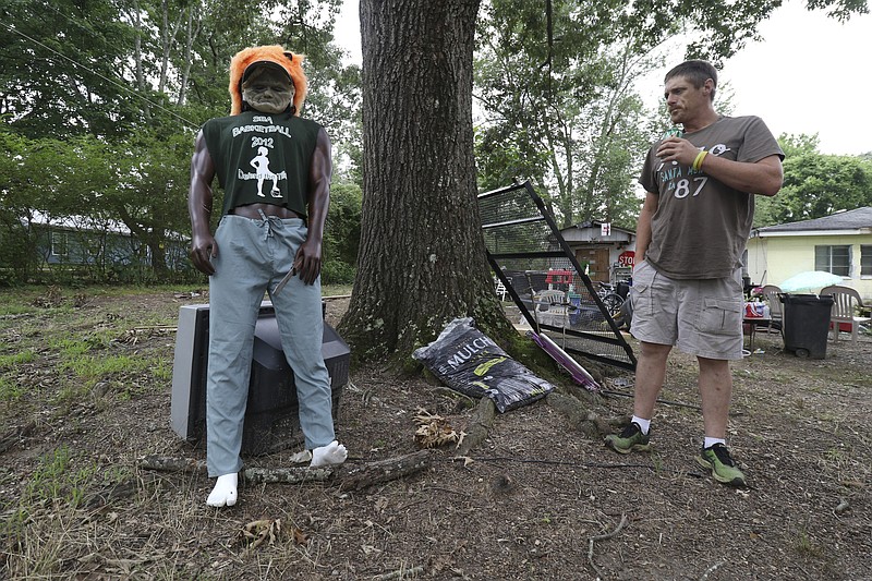 Photo by Dan Henry / The Chattanooga Times Free Press. Gary "Bubba" Couey stands next to "Buford" the mannequin which he assembled on his girlfriends rural Ooltewah, Tenn., property. 