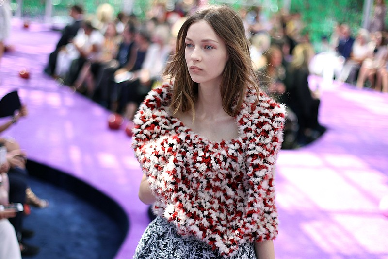 
              A model wears a creation for Christian Dior's fall-winter 2015/2016 Haute Couture fashion collection presented in Paris, France, Monday, July 6, 2015. (AP Photo/Thibault Camus)
            