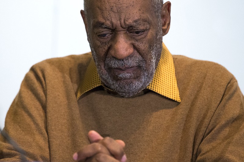 In this Nov. 6, 2014, file photo, entertainer Bill Cosby pauses during a news conference. Cosby admitted in a 2005 deposition that he obtained Quaaludes with the intent of using them to have sex with young women.