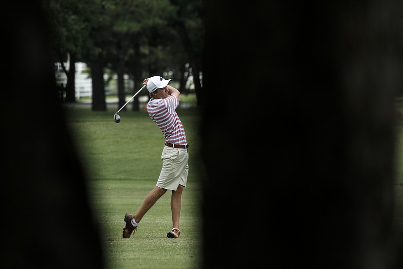 Dylan Lillard hits from the 6th fairway during the first round of the Tennessee Junior Amateur tournament Tuesday, July 7, 2015, at Cleveland Golf and Country Club in Cleveland, Tenn.