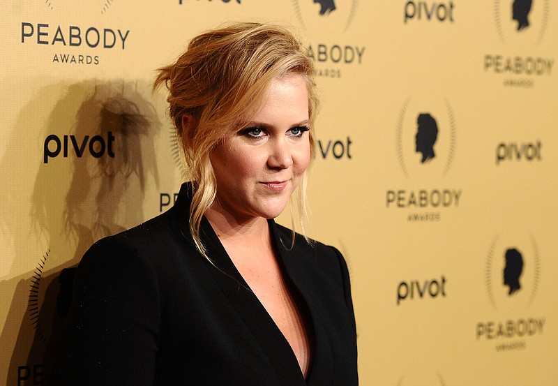 
              FILE - In this May 31, 2015, file photo, comedian Amy Schumer attends the 74th Annual Peabody Awards in New York. Schumer and Aziz Ansari will be the headliners this year when the Oddball Comedy & Curiosity Festival hits the road looking for laughs, kicking off on Aug. 28, at Kansas City’s Starlight Theatre. (Photo by Charles Sykes/Invision/AP, File)
            