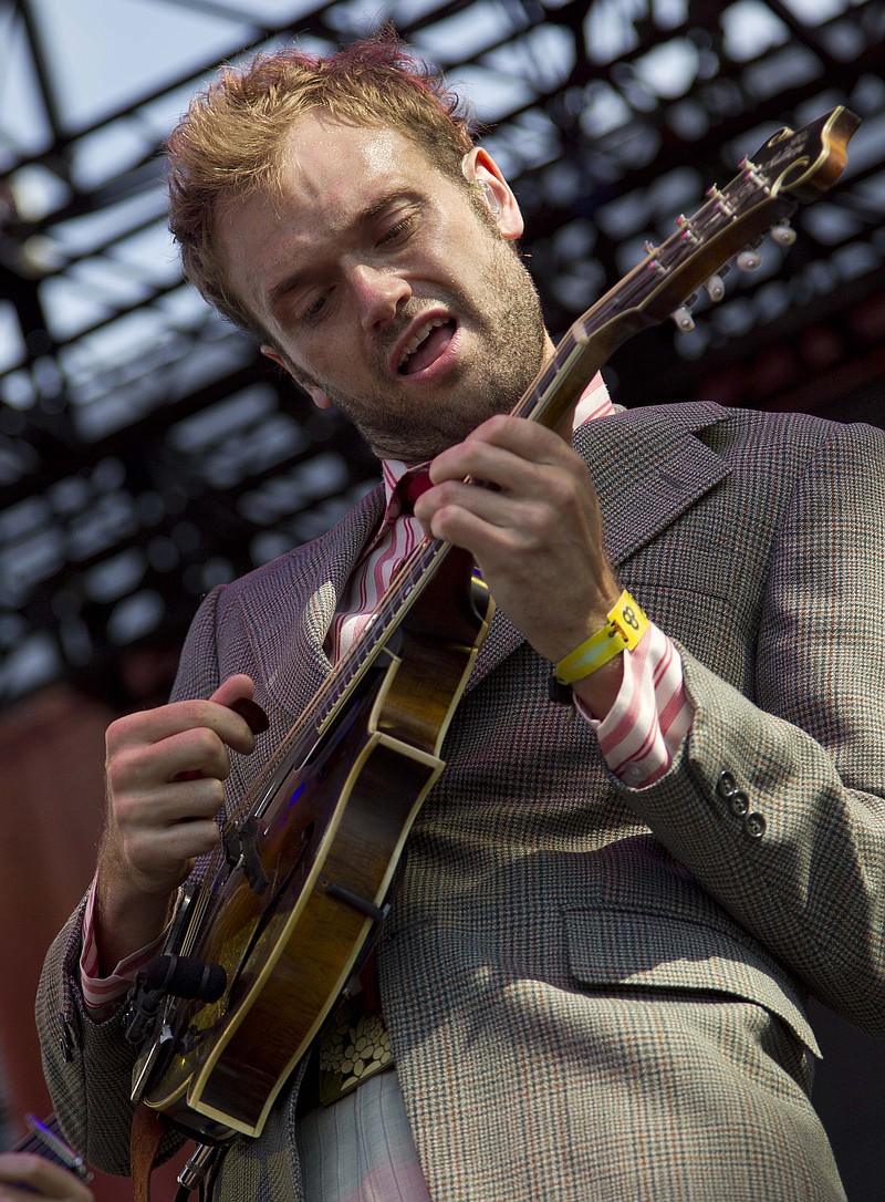 
              FILE - In this June 9, 2012 file photo, Chris Thile performs during the Bonnaroo Music and Arts Festival in Manchester, Tenn. The mandolin whiz will host back-to-back ‘A Prairie Home Companion’ shows in St. Paul during the 2015-16 season, as well as co-host two shows with creator Garrison Keillor in San Diego and New York. (AP Photo/Dave Martin, File)
            