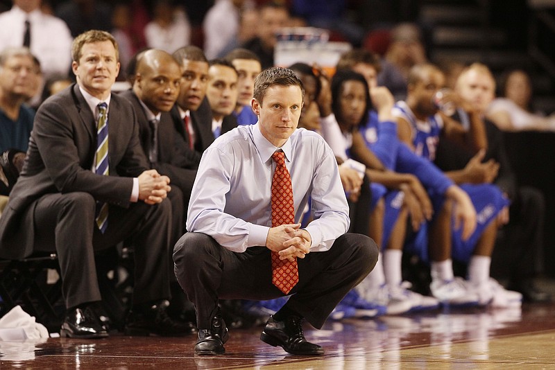 Louisiana Tech head coach Michael White looks on against Denver during the second half of Denver's 78-54 victory in an NCAA basketball game in Denver on Saturday, March 9, 2013. (AP Photo/David Zalubowski)