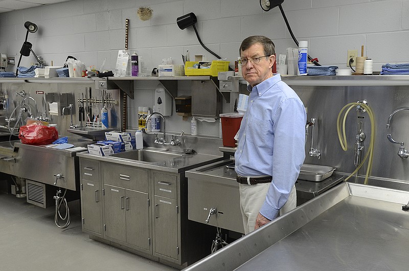 Hamilton County Medical Examiner James Metcalfe is photographed at the Forensic Center on Amnicola Highway in this file photo.