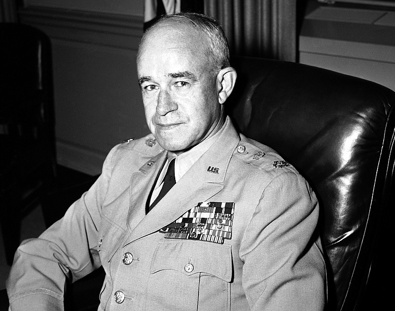 
              FILE - In this Sept. 22, 1951, file photo, Joint Chiefs of Staff Gen. Omar Bradley poses in his office after being promoted to the five-star rank of General of the Army in Washington, wearing his new insignia. Bradley was the first chairman of the Joint Chiefs. (AP Photo/Byron Rollins, File)
            