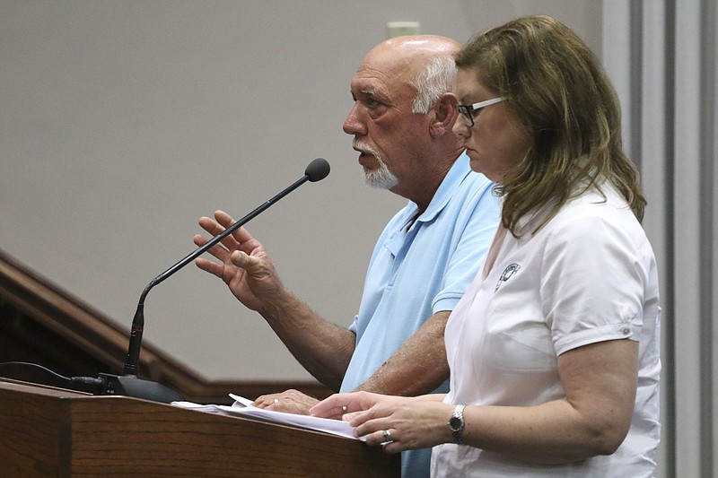 Staff Photo by Dan Henry / The Chattanooga Times Free Press- 6/3/15. Small business owners Gene Shipley and Kay Keefe speak to county commissioners about their concerns with WWTA on Wednesday, June 3, 2015. 