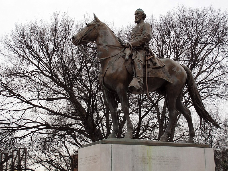 FILE - In this Feb. 6, 2013 file photo, a statue of Nathan Bedford Forrest sits on a concrete pedestal at a park named after the confederate in Memphis. The city wants the statue removed.